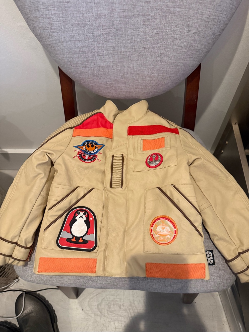 Disney Beige Kids Puffer Jacket with Orange & Red Patch Accents